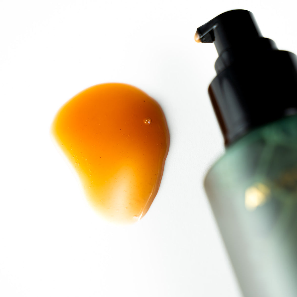 Contents of AyurScience Beauty Purity foaming gel cleanser shown, yellowish/brown or golden coloured.