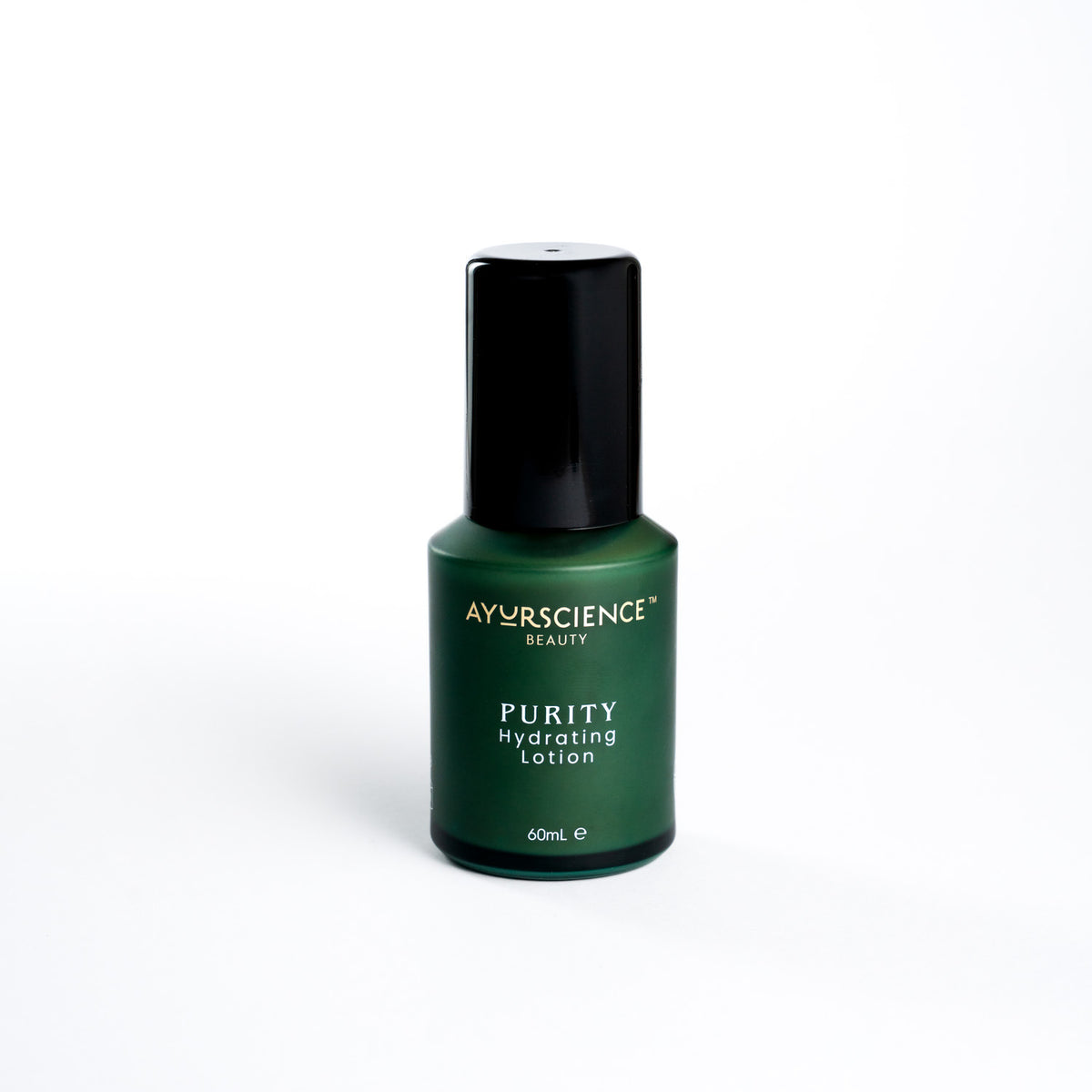 A bottle of Ayurscience PURITY Hydrating Lotion with a dark green label and a black cap.