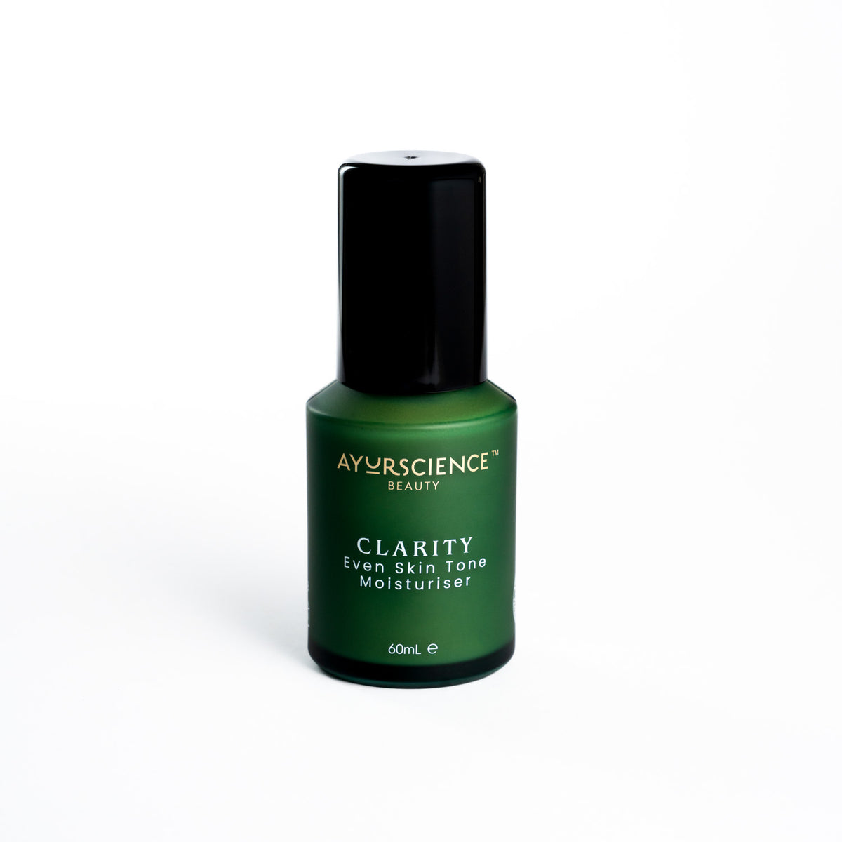 A bottle of AyurScience Beauty CLARITY Even Skin Tone Moisturiser with a green label and black cap.